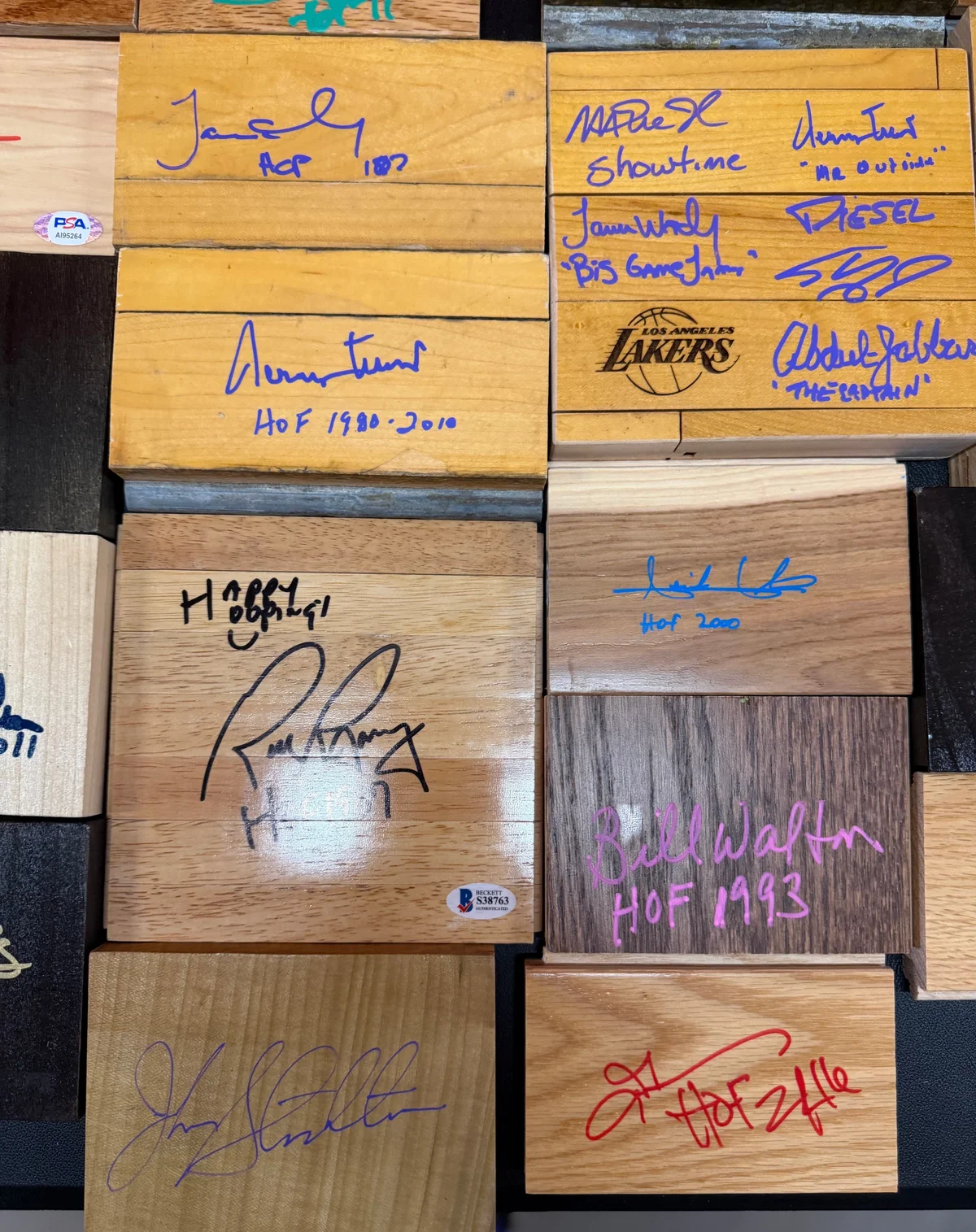 Game Used Floor and Wood Pieces Signed by NBA Hall of Famers - Collection Lot