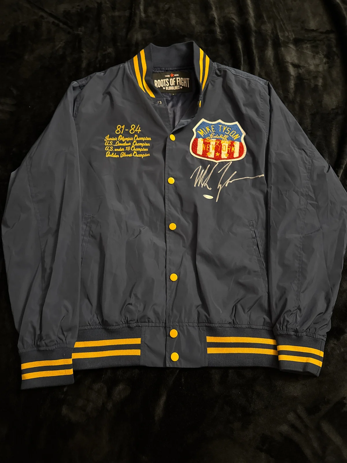 Mike Tyson signed Roots of Fight jacket 
