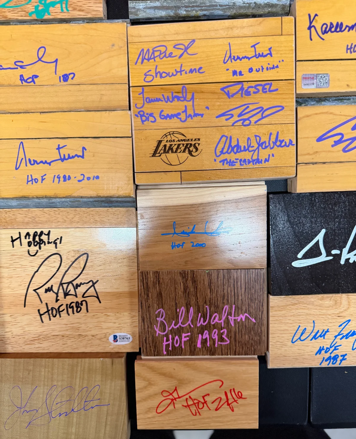 Game Used Floor and Wood Pieces Signed by NBA Hall of Famers - Collection Lot